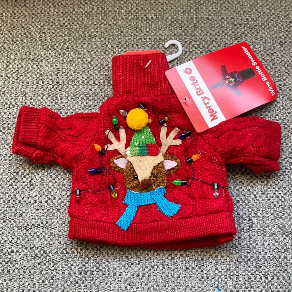 Wine bottle sweaters in different styles, Santa, reindeer, snow man